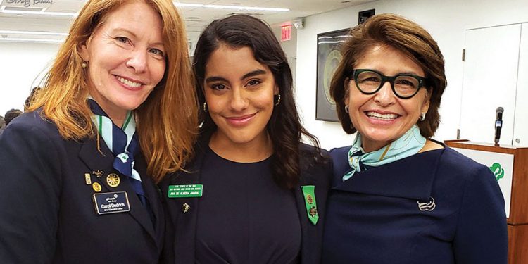 Ana de almeida amaral is pictured with carol and girl scouts of the usa ceo sylvia acevedo cover