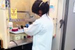 Dr maciejewski conducting research in the novavax maryland lab