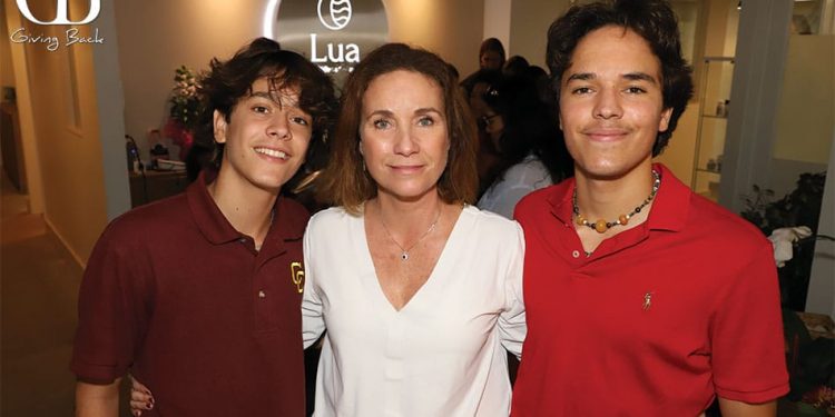 Conchita gonzalez perez with her sons emilio and bruno perez at the lua wellness center grand opening