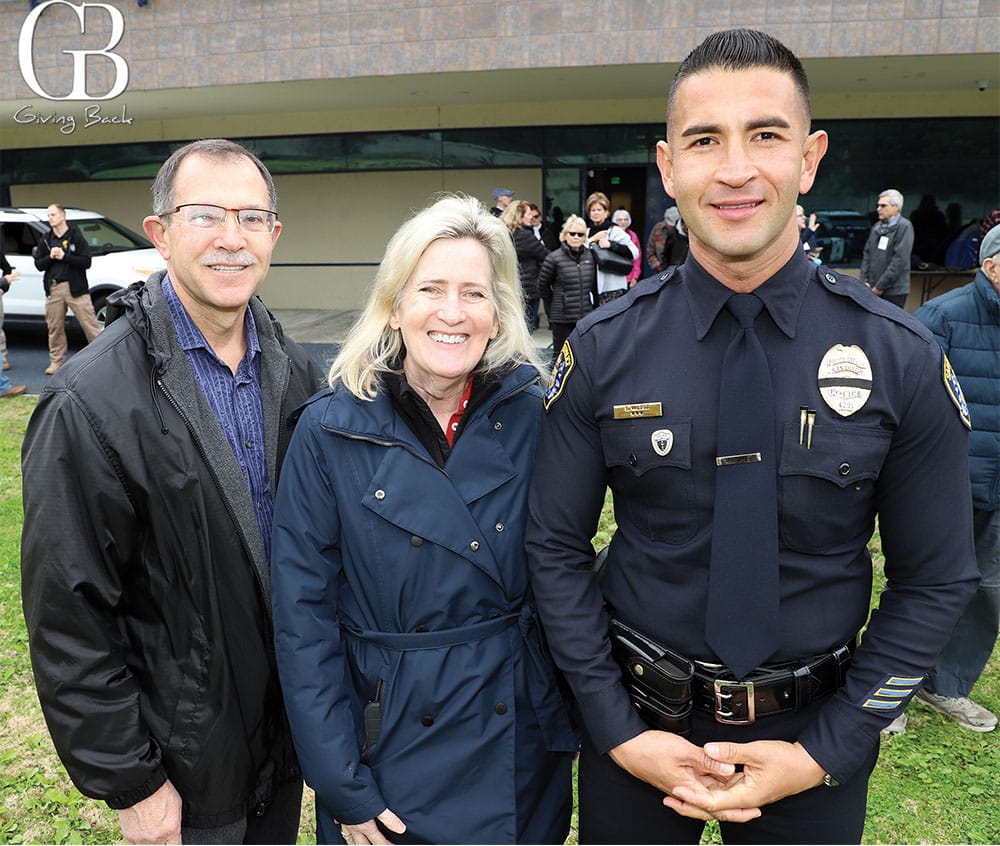 Mark and Deanne Monte with Officer Erick Valdez