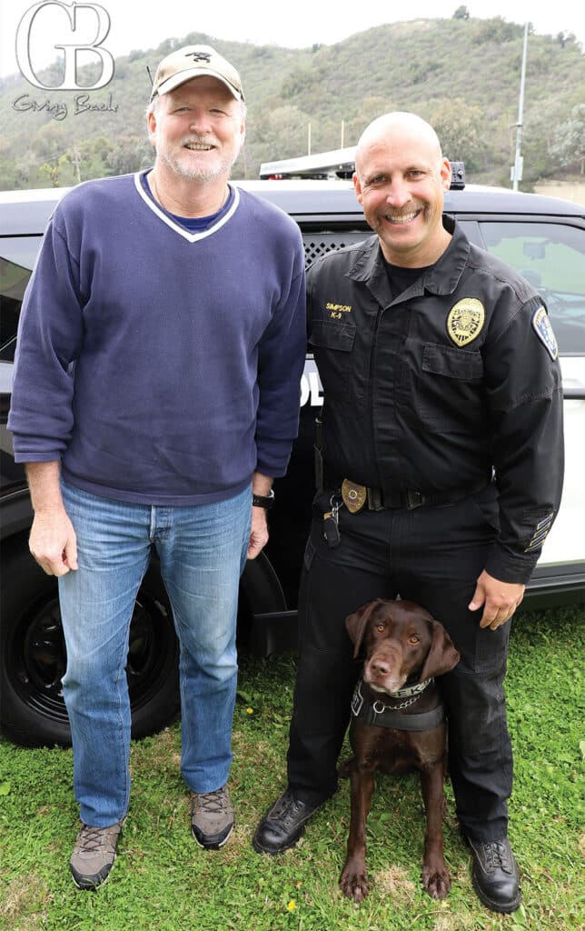 Robert Rice and Officer Robert Simpson with Tula