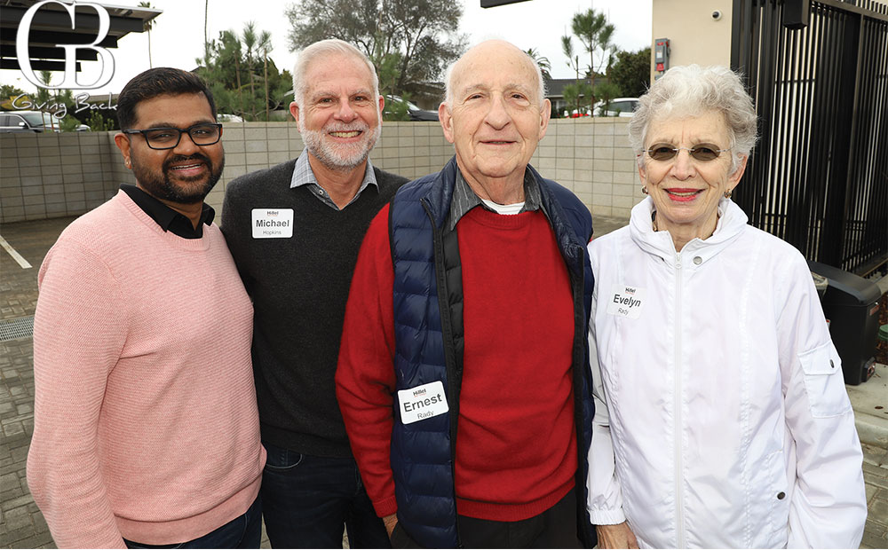 Supreeth Manjunatha and Michael Hopkins with Ernest and Evelyn Rady