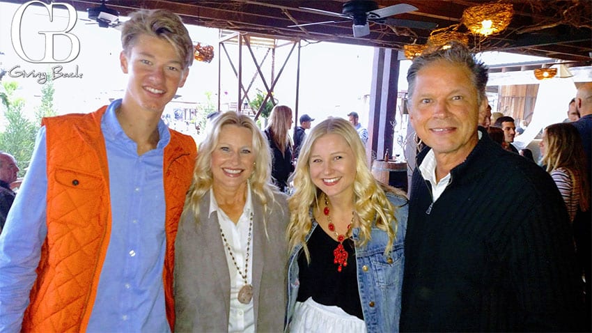 Merridee Book WITH HUSBAND and other people