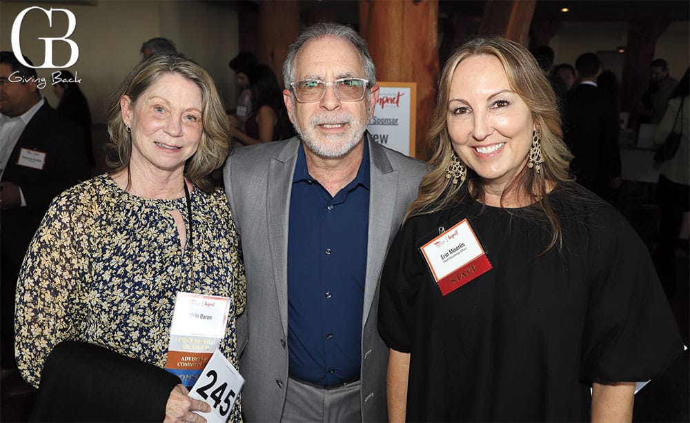 Vicki and Moises Barron with Erin Miserlis