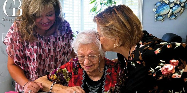 Carmen castaneda a rosie the riveter at age 100 celebrating with family members