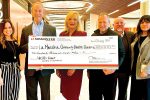 Doug wright presents 0000 grant to la maestra community health centers