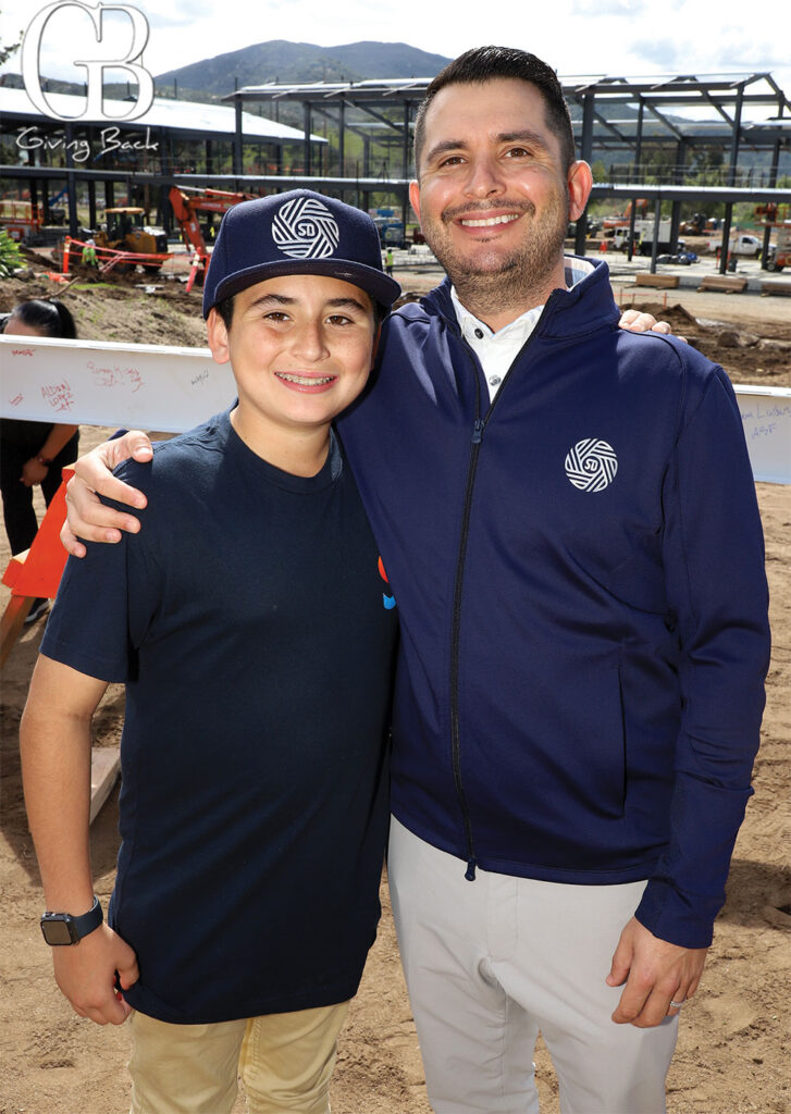 Joshua Muse and Josh Muse from San Diego FC celebrate the topping-off at the new training campus.