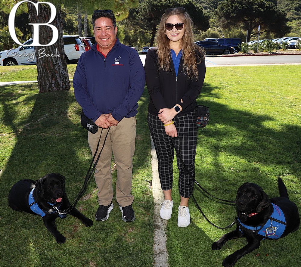 Ron Morelos with Maverick and Zoey Lierman with Ryder