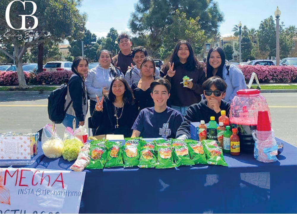 Elvira with her peers during a MEChA club fundraiser