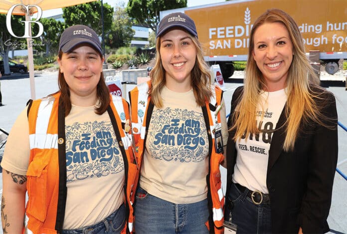 Allison Brookover, Jasmin Ross, and Alex Gruber at Feeding Bodies, Fueling Minds: Life Science Community Unites for Hunger Relief