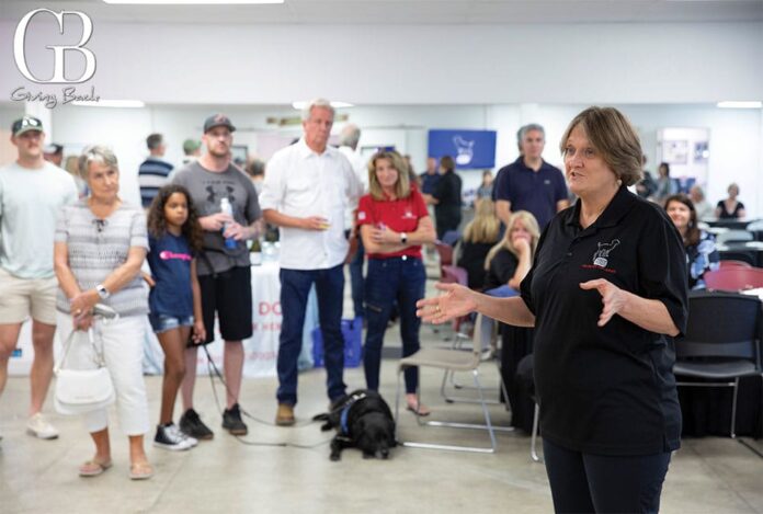 Peggy Poore speaking to class