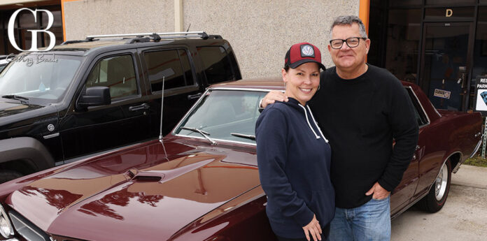 Eve Mazzarelli and Thor Eakes with a 1965 Pontiac GTO
