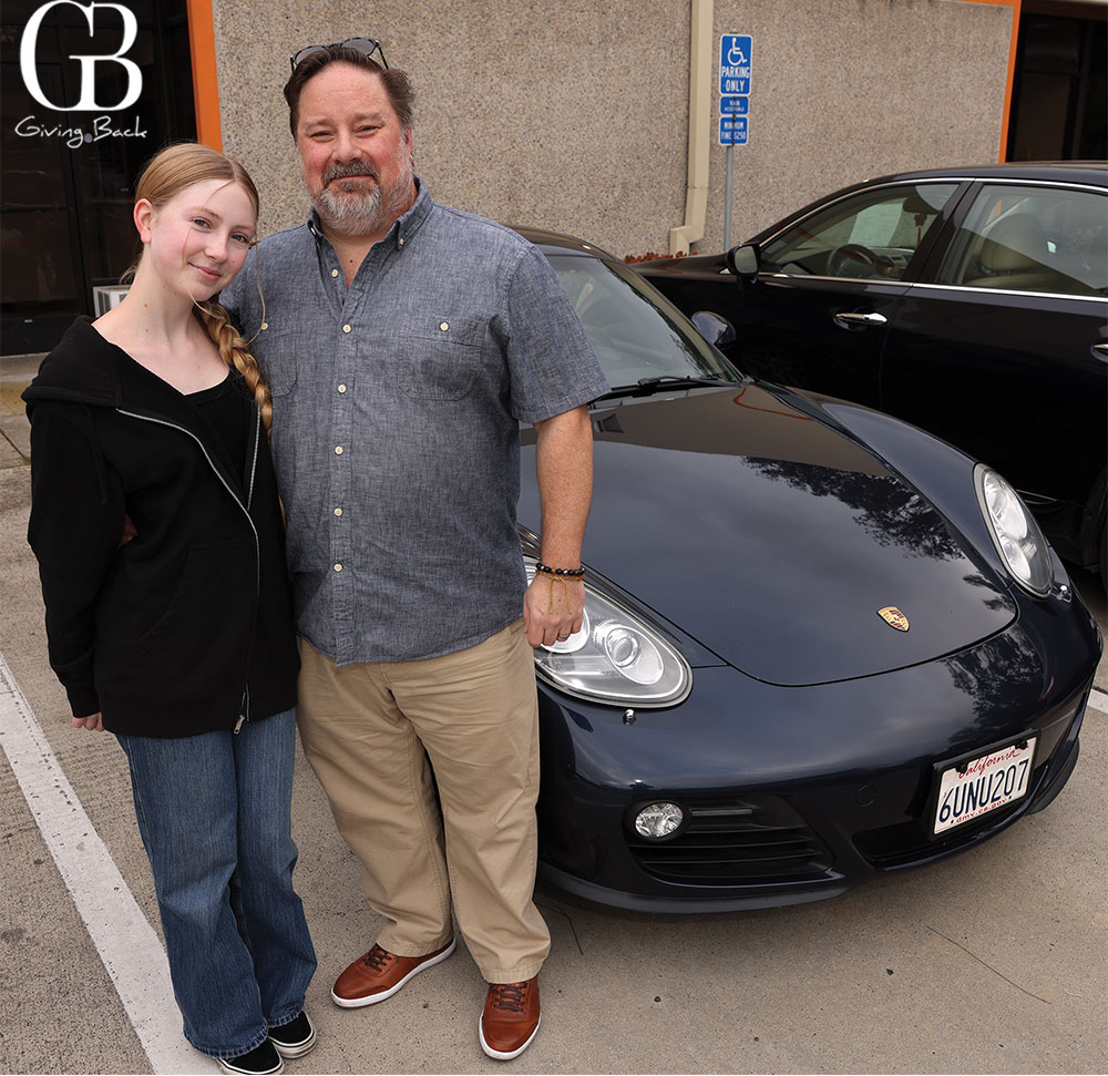 Annika-and-Mike-Herbst-with-2010-Porsche-Cayman - GB Magazine Annika and Mike Herbst with 2010 Porsche Cayman