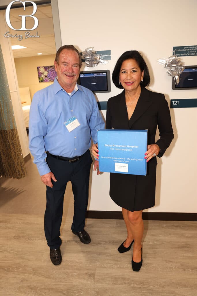 John and Dee Ammon cutting the ribbon on the room they sponsored