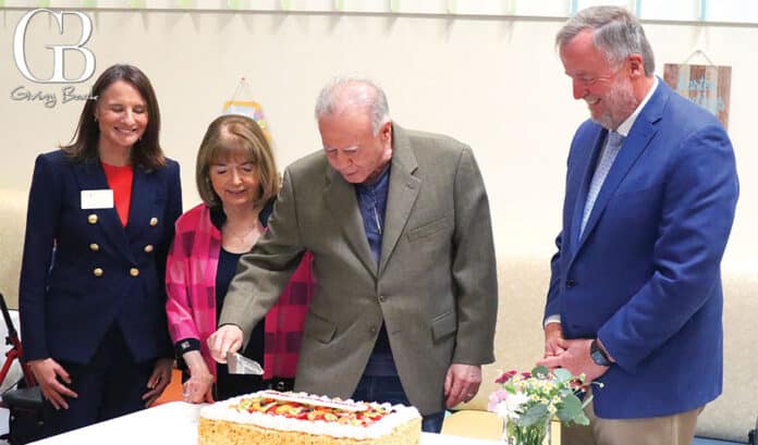 President and CEO Melinda Forstey, Mary and Gary West, and retired President and CEO Paul Downey celebrating the 15-year milestone