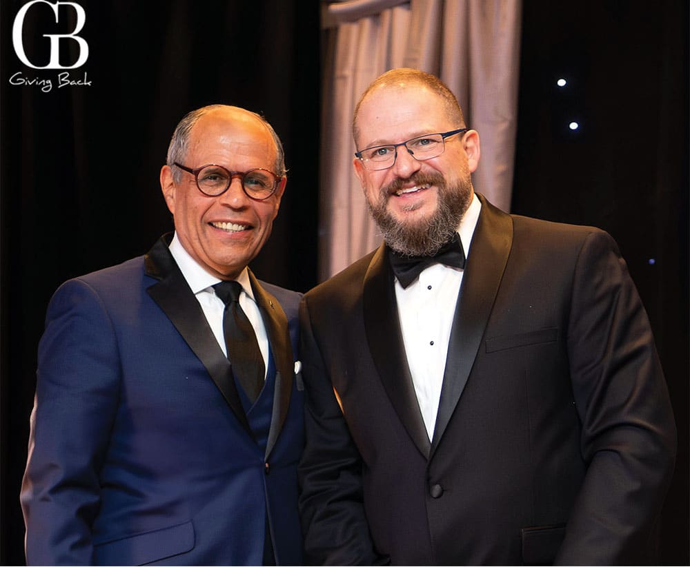 Father-Joes-Villages-President--CEO-Deacon-Jim-Vargas-with-Qualcomm-President--CEO-Cristiano-Amon-at-the-Beacon-of-Hope-Gala - GB Magazine Father Joes Villages President CEO Deacon Jim Vargas with Qualcomm President CEO Cristiano Amon at the Beacon of Hope Gala