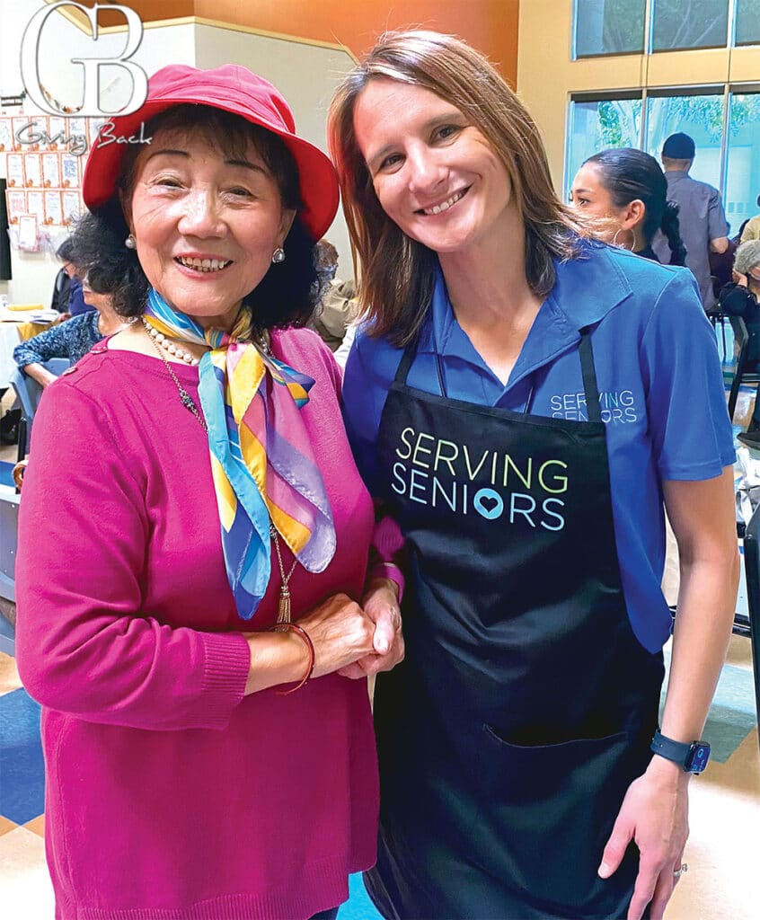 President-and-CEO-Melinda-Forstey-at-Wellness-Center-with-a-client - GB Magazine President and CEO Melinda Forstey at Wellness Center with a client