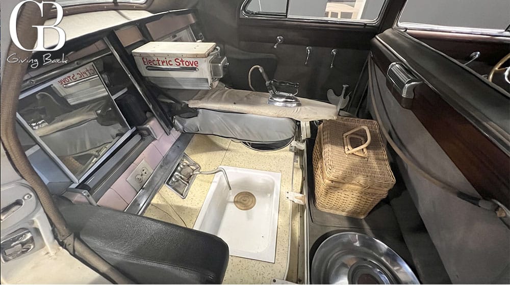 Back seat of the car Louie Mattar drove across the continent non stop twice in the 1950s