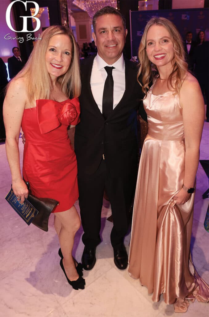 Emily and Cesar Gimenez with Sallie Reyes