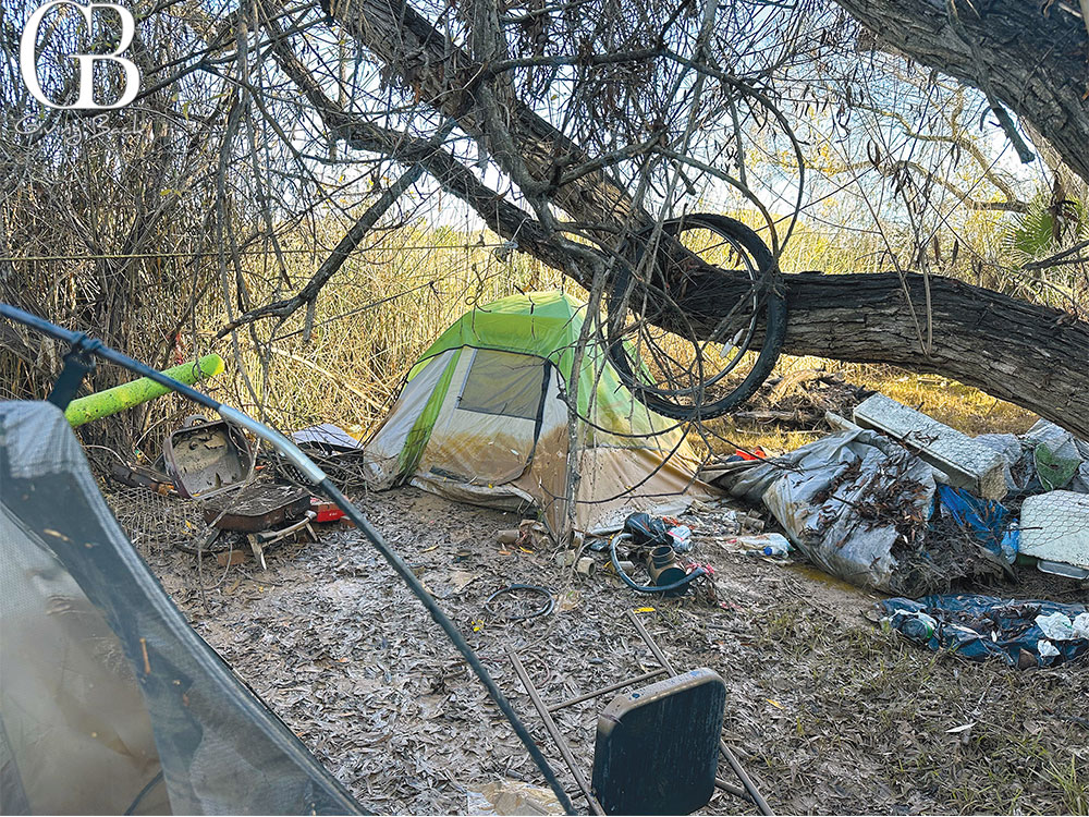 Flooded encampment in the San Diego River