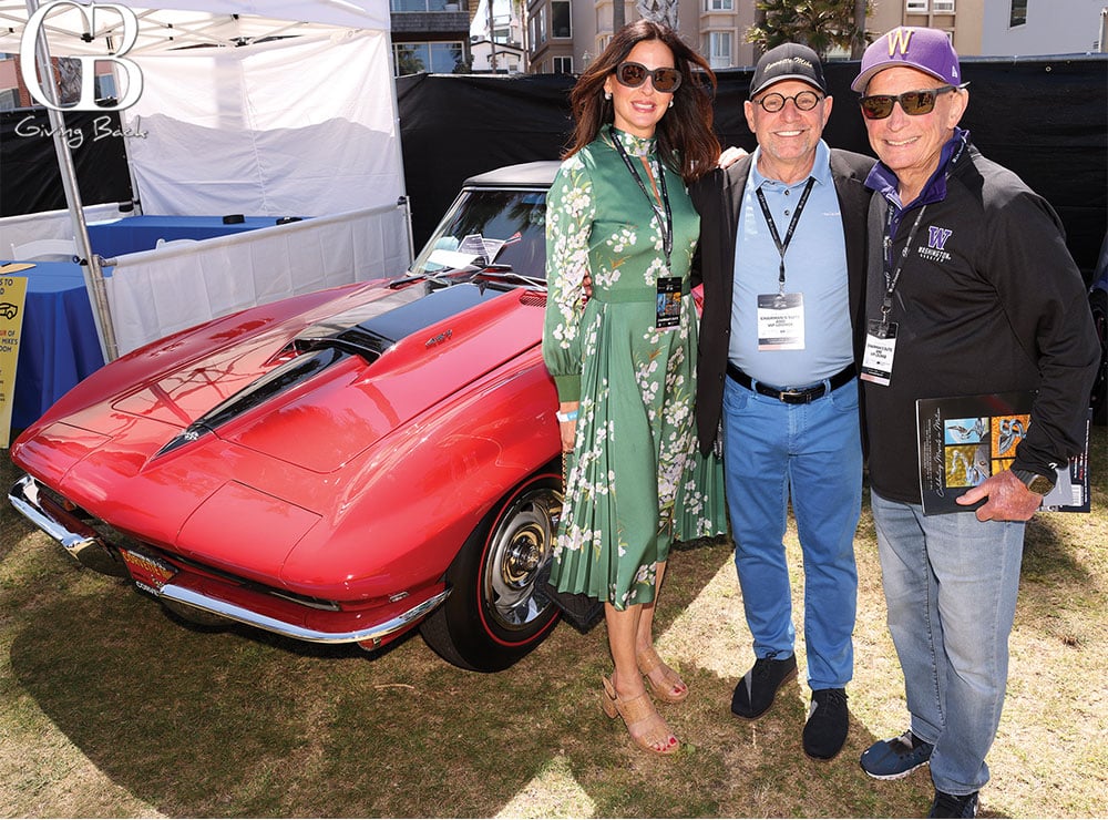 Laurrin Ortiz Mena Michael Vietro and Chuck Spielman with a 1967 Corvette 427
