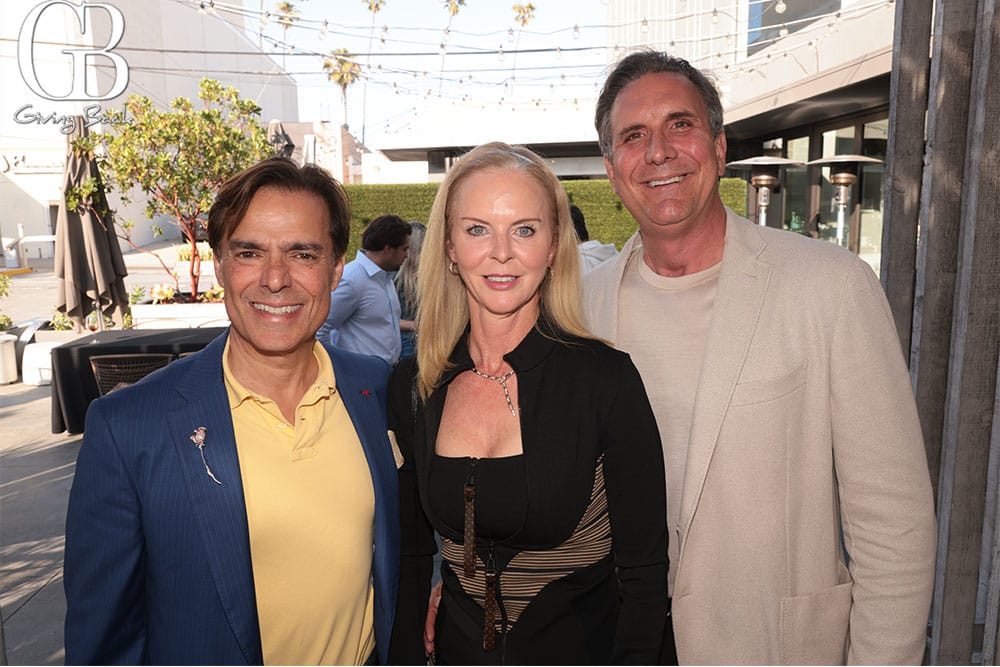 Vahid Moradi with Lisa and Ben Arnold