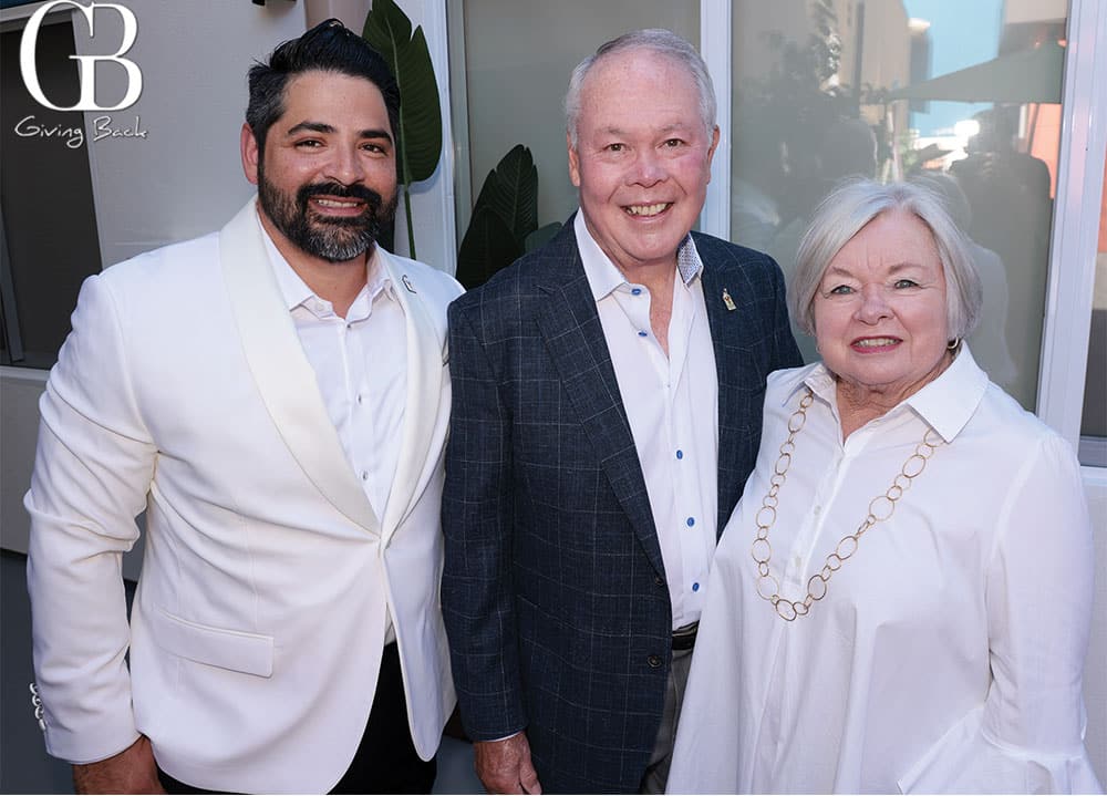 Oscar Gomez with Paul and Melody Peterson