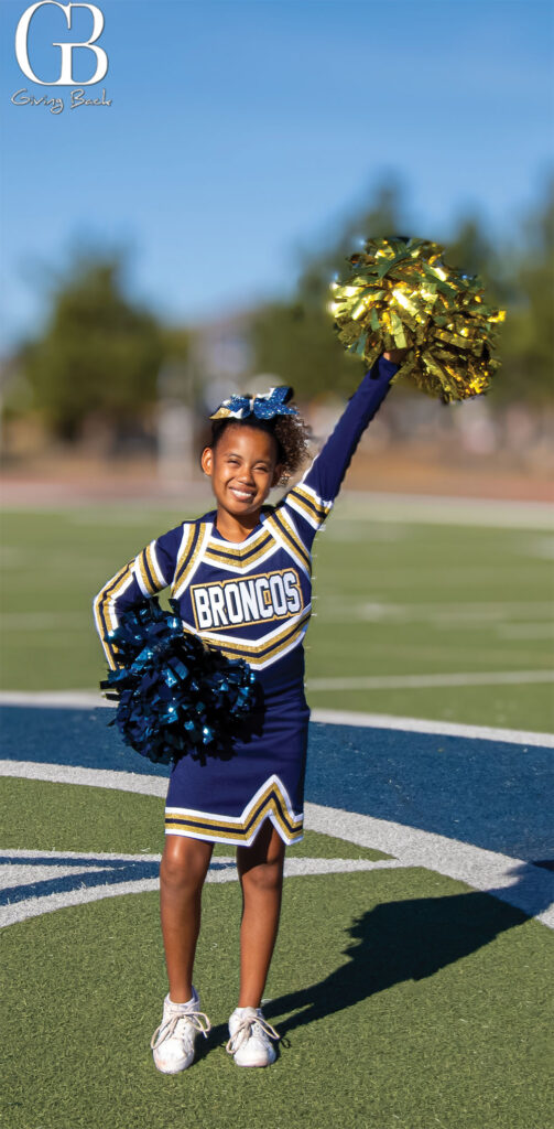 Today Karmen enjoys cheerleading and is in her 4th year with Junior All American Football  Cheer