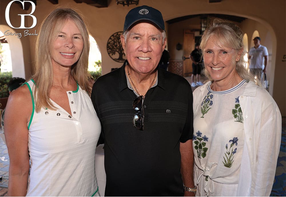 Raquel and Greg Rogers with Gwendolyn Sontheim
