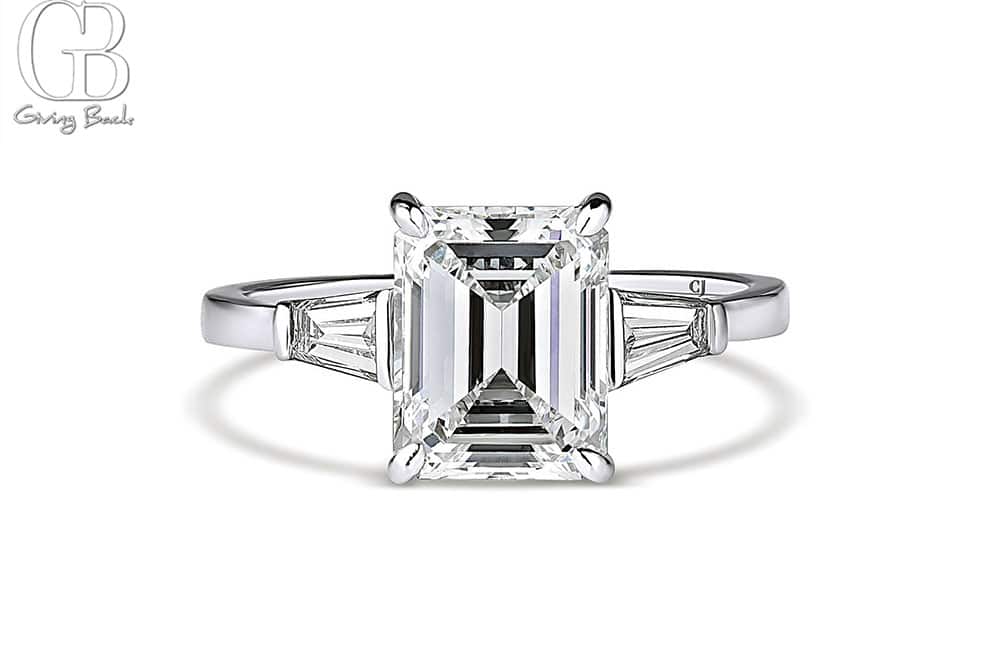 Rivière platinum 302ct G color Internally Flawless emerald cut diamond ring with side tapered baguette diamonds GIA Certified