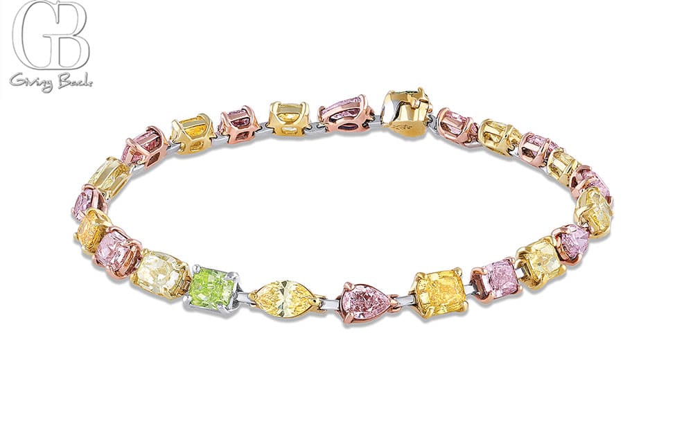 Rivière platinum and 18kt gold 1141ctw rainbow color diamond bracelet GIA certified