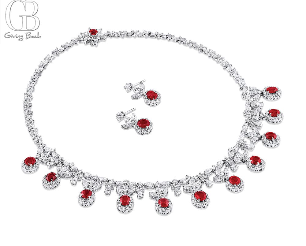 Estate platinum Burmese ruby and diamond necklace and earrings set 1840 carat total weight of natural unheated Burmese rubies and 2388 carat total weight of diamonds Gübelin Certified