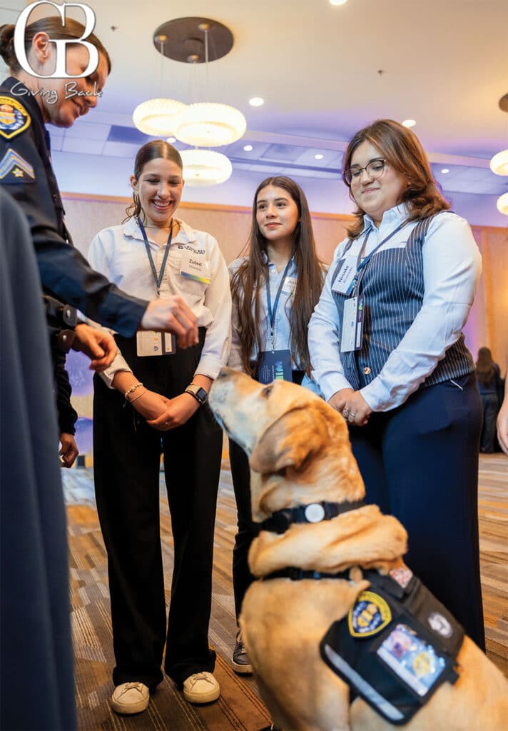Det-Natalie-Hone-and-K9-Lyle-Hope-with-young-aspiring-leaders-at-Women-in-Blue - GB Magazine Det Natalie Hone and K9 Lyle Hope with young aspiring leaders at Women in Blue