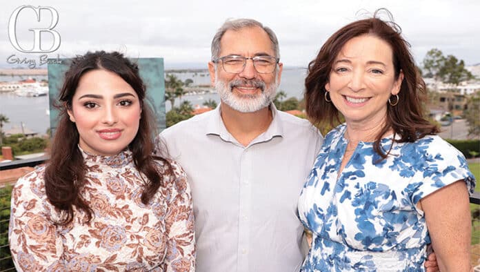 Mariam Ahadi with Todd and Janet Simpson