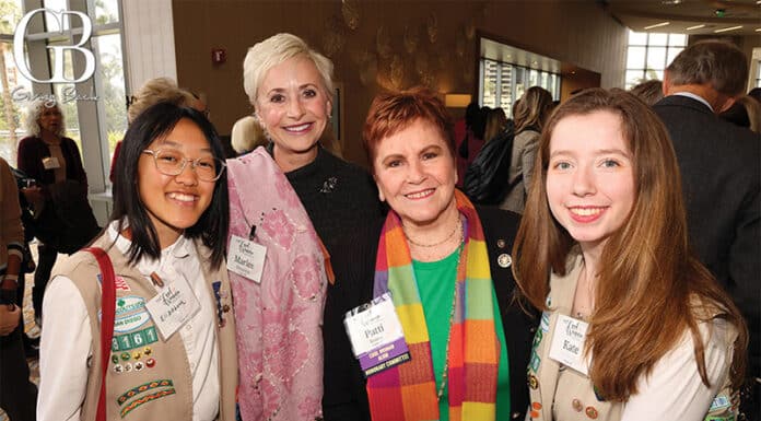Girl Scout Elizabeth W., Marlee Ehrenfeld, 2026 Cool Women Chair Patti Roscoe and Girl Scout Kate B.