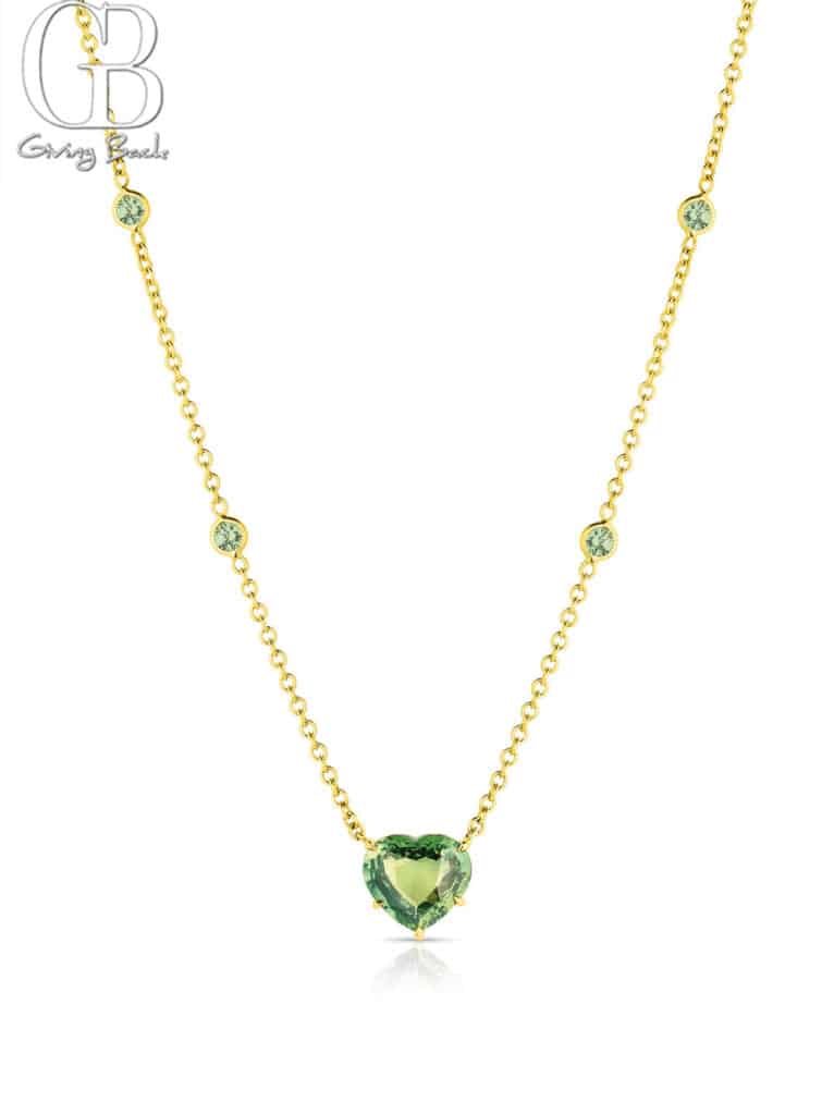 18k Yellow Gold 302ct Green Sapphire Heart Shaped Necklace - GB Magazine 18k Yellow Gold 302ct Green Sapphire Heart Shaped Necklace