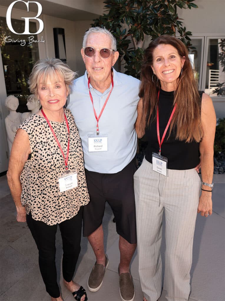 Sharon-and-Richard-Bockoff-with-Dorell-Sackett - GB Magazine Sharon and Richard Bockoff with Dorell Sackett