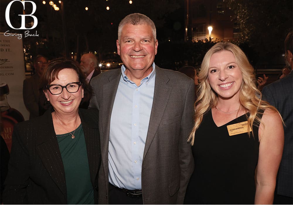 Stephanie and Dennis Landall with Alex Rak