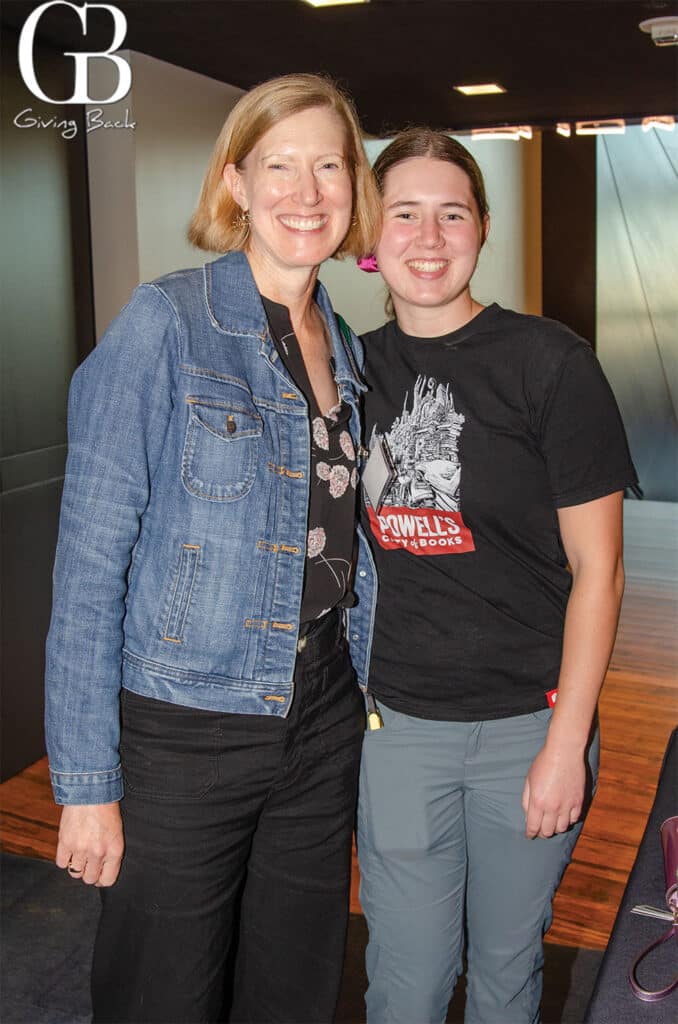 Anna and Ella Crotty's t-shirt, logo in corner.