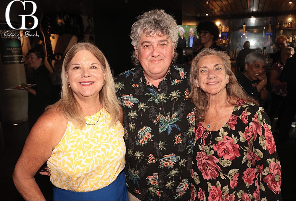 Deanna Mackey with Mark and Catherine Scanlon