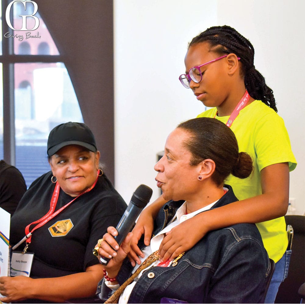 3rd-Grader-Davida-Morrow-and-Auntie-Cheryl-at-an-Urgent-Care-Community-Meeting - GB Magazine 3rd Grader Davida Morrow and Auntie Cheryl at an Urgent Care Community Meeting