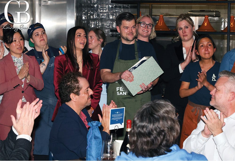 Chef-Travis-and-Mia-receive-the-news-that-their-efforts-will-take-a-school-off-the-waitlist - GB Magazine Chef Travis and Mia receive the news that their efforts will take a school off the waitlist