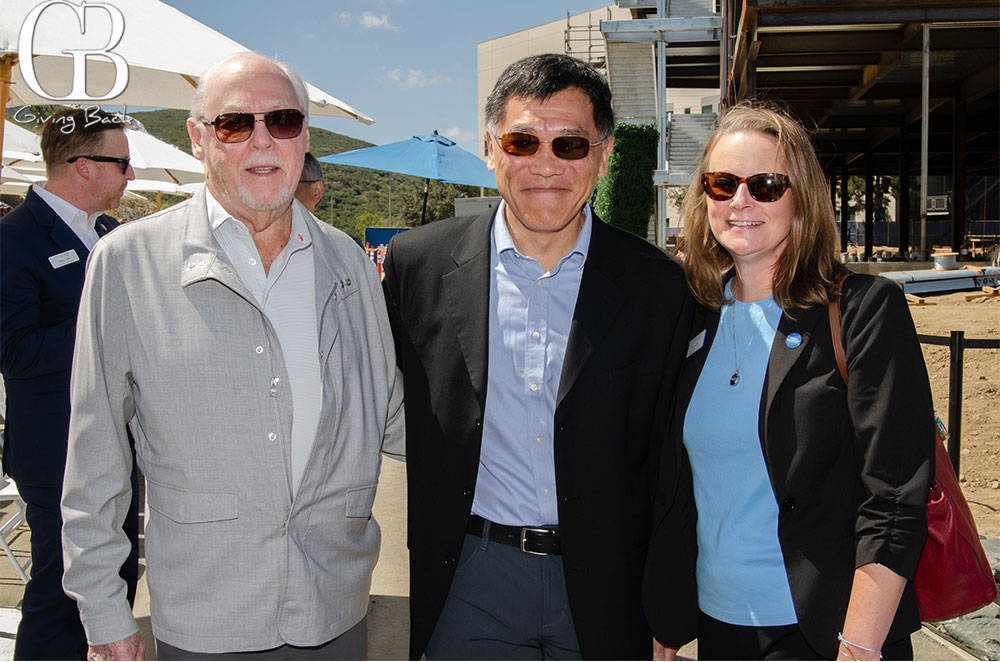 Dan Epstein Simon Kuo and Donna Day' Giving Back' logo in the upper left corner.