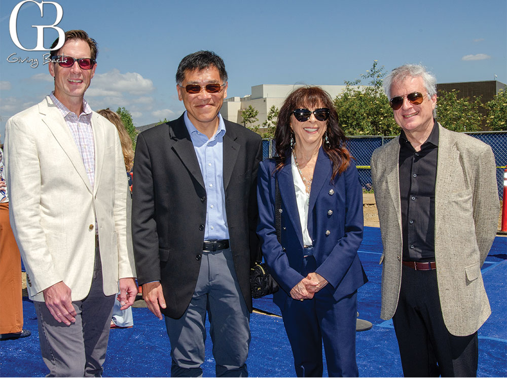 Edward Price Simon Kuo with Katherine and Theodore Kantardjieff'GB Giving Back' logo in the upper left corner.