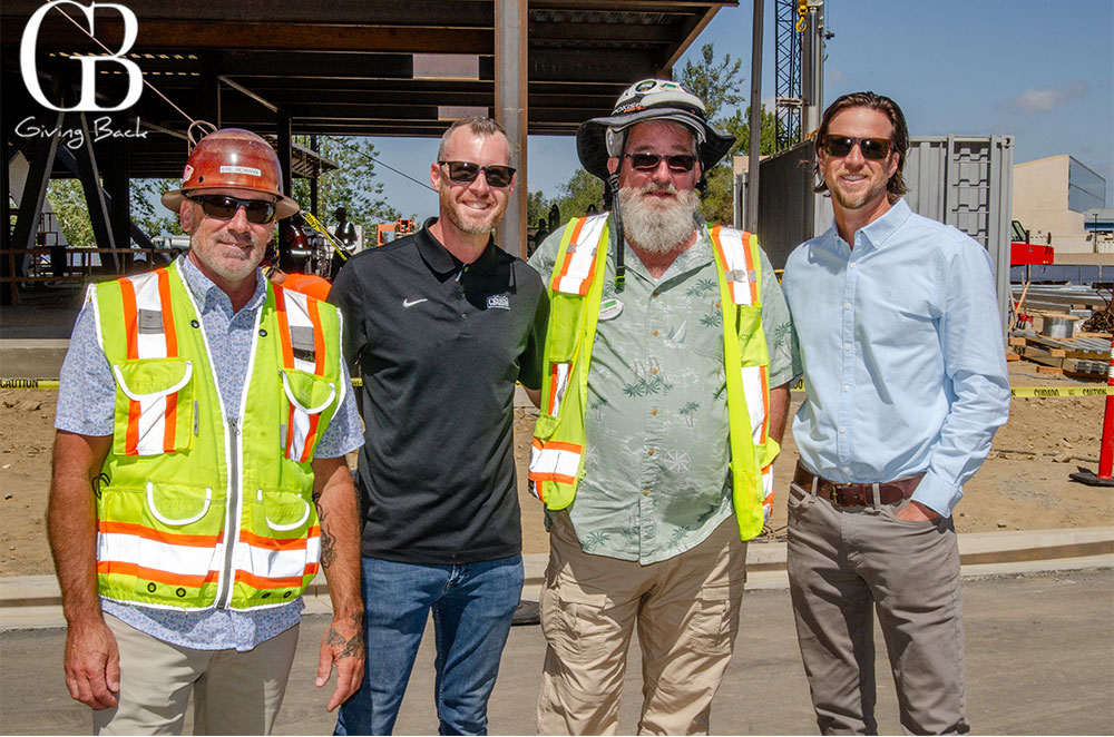 Eric Mcmann Bryan Lichd Dayle Imlay and Matt Lulling'GB Giving Back' logo in the corner.
