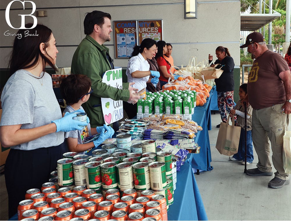 Families-receive-food-at-the-Feeding-San-Diego-School-Pantry-at-Burbank-Elementary - GB Magazine Families receive food at the Feeding San Diego School Pantry at Burbank Elementary
