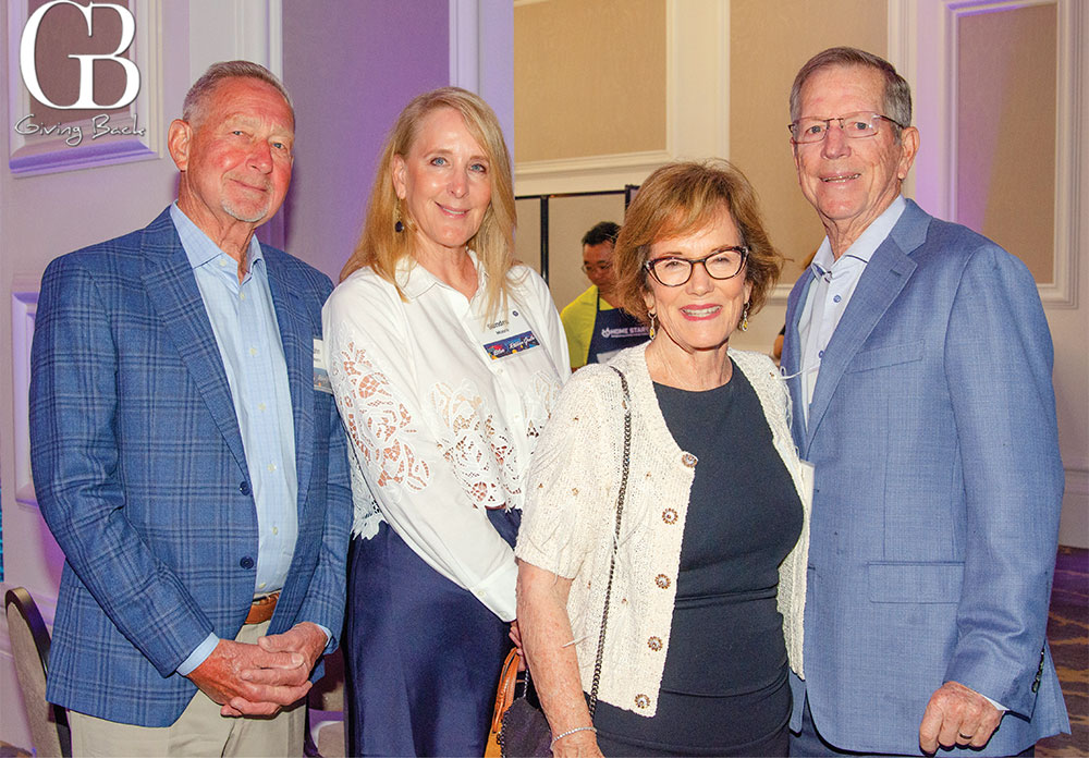 John and Sandra Moore with Nancy and Norv Turner