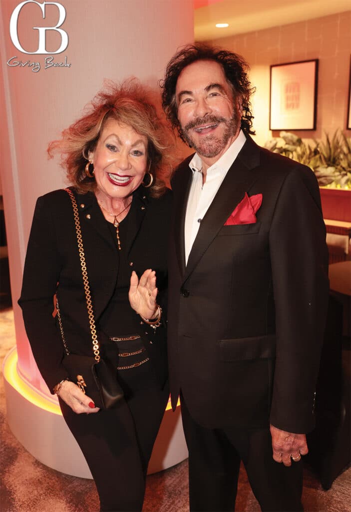 Barbara and Howard Milstein'Giving Back' logo in the top-left corner.